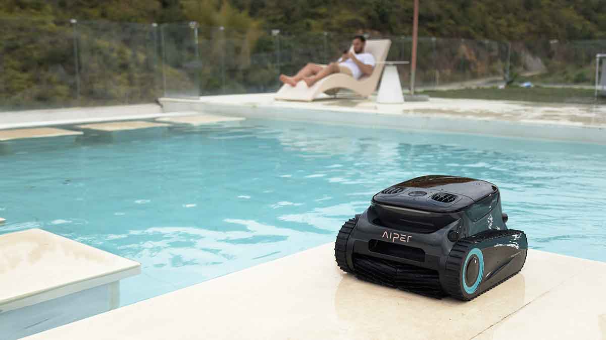 Automatic inground pool cleaner working on the pool floor